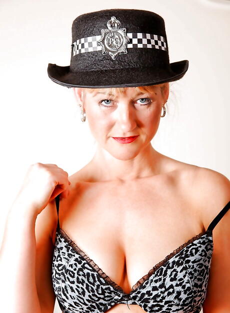 Sexy american mature Suzy exposes her butt in uniform outfit and toying her snatch 